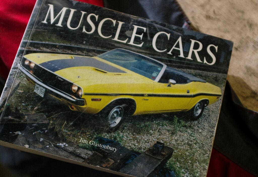 Image of a muscle car with writing on a magazine.